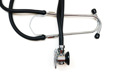 Black Stethoscope or phonendoscope on the white background close up isolated on white, Treatment of...