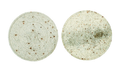 Small Buddha image or Thai amulet isolated on white background