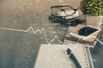 Double exposure of forex chart drawing and cell phone background. Concept of financial trading