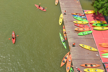 Kayak station with colorful kayaks