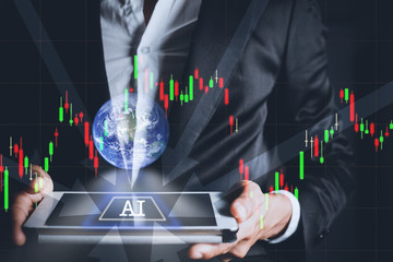 Businessman analyzing graph and chart finance of marketing with data information. analysis graph stock market trading.Some elements of this image furnished by NASA.