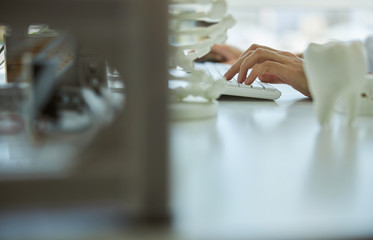 Caucasian male hands typing on the keyboard