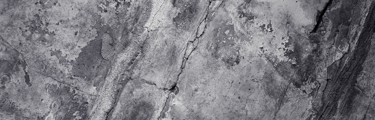 Fototapeta premium Panoramic background - old dark concrete wall with cracks