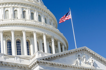 United States Capitol Building dome detail and waving U.S. National flag  - Washington D.C. United States of America - obrazy, fototapety, plakaty