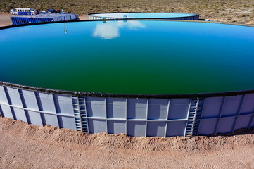 battery of water tanks in reservoir
