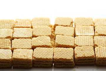 A wafer is a crisp, often sweet, very thin, flat, light and dry biscuit