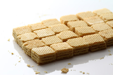A wafer is a crisp, often sweet, very thin, flat, light and dry biscuit