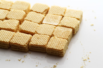 A wafer is a crisp, often sweet, very thin, flat, light and dry biscuit