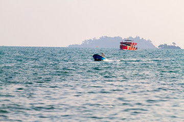 The boat small and big play at beach