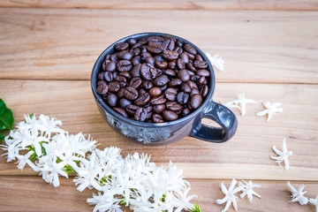 Coffee cup with coffee beans
