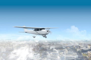 Aircraft flying in the air above the city