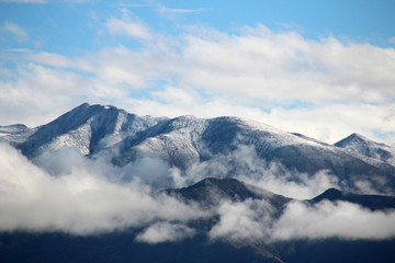 Fototapeta na wymiar View of mountains with the snow on peak in the morning, Tibet, China