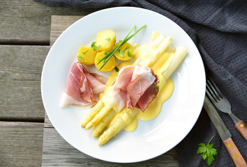 White Asparagus with Black Forest Ham and Hollandaise Sauce. Asparagus European menu.