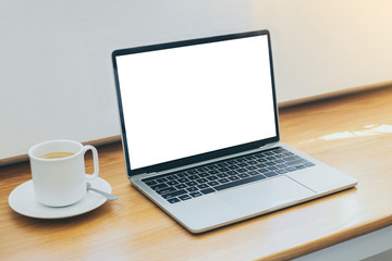 computer mockup image blank screen.laptop with white background for advertising,contact business search information on desk at coffee shop.marketing and creative design