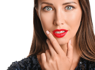 Young woman with beautiful makeup on white background