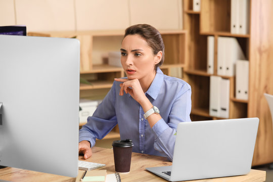 Female programmer working in office