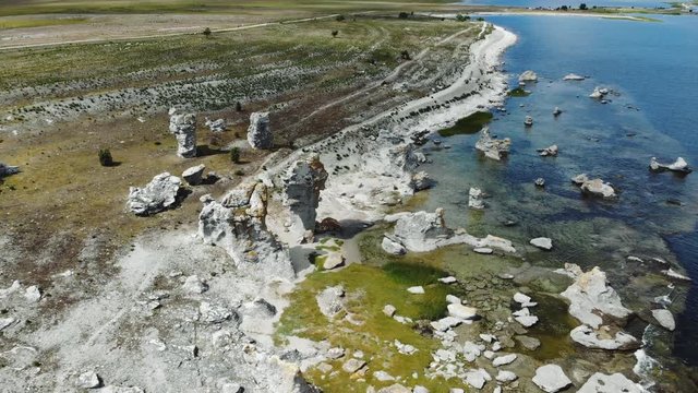 Drone pull back from Rauks or seastacks on Gotland Island, Sweden