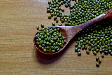 Closeup of Fresh Mung Beans in a wooden spoon as background, Full depth of field.