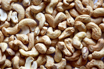 Closeup of Cashew Nuts isolated on the white background, Full depth of field.