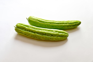 Close up of Fresh Green Bitter melon isolated on white background.