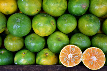 Closeup of Fresh ripe oranges for sale on a market in Thailand.