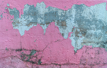 Old pink vintage wall texture for the background, Dirty grunge concrete crack wall texture background. The paint is dirty and damaged.