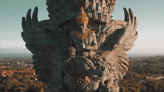 Bali's Most Iconic Landmark Hindu God Garuda Wisnu Kencana statue also GWK statue is a 122-meter tall statue located in Garuda Wisnu Kencana Cultural Park, Bali, Indonesia. 4k Aerial view