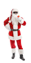 African-American Santa Claus with cocktail on white background