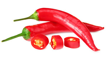 sliced red hot chili peppers isolated on white background