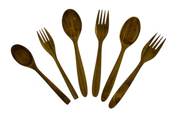 Wooden Teak Spoon and Fork isolated on  background  top viwe