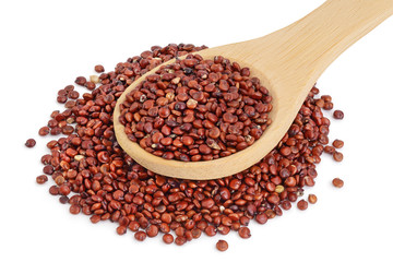 red quinoa seeds in wooden spoon isolated on white background with clipping path and full depth of field