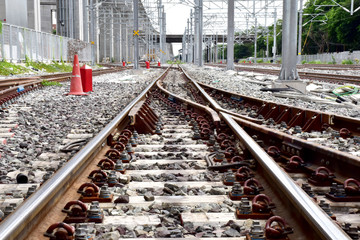 Trains running on the train tracks to the station in Thailand. Select focus with shallow depth of...