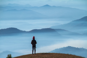 Fototapeta premium young woman on the mountain