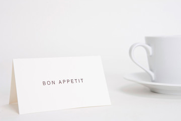 coffee cup and paper card