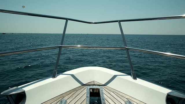 A wide-angle shot of the front of the yacht in the summer. Sea view. Horizon. No people. Summer.