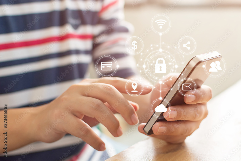Poster close-up image of male hands using mobile smartphone with icon graphic cyber security network of con