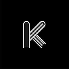 Initial K letter logo design isolated on dark background