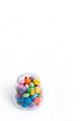 candies and chocolates in glass bottle