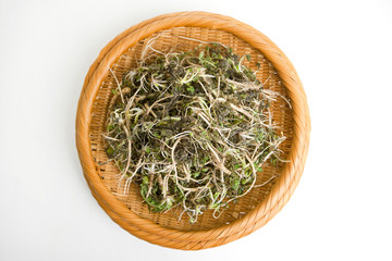 spring vegetables in wicker tray