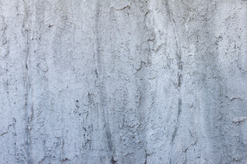 Textured of plastered cement wall is uneven is design and concept for background.