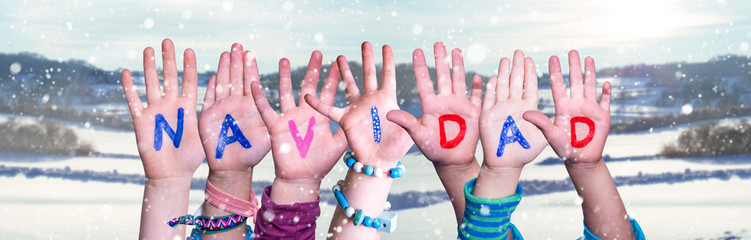 Children Hands Building Word Navidad Means Christmas, Snowy Winter Background