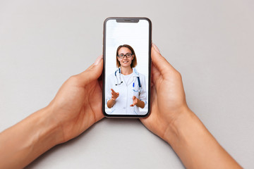 Woman doctor helps relieve stress from the crisis caused by coronavirus, video conferencing, online...