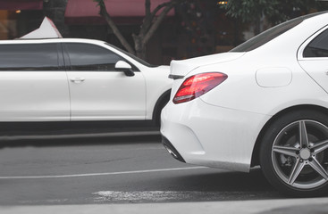 Fototapeta na wymiar White modern car in the city.