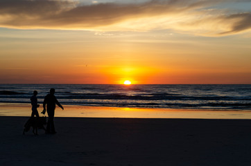 Fototapeta na wymiar Sunrise Walk on Jacksonville Beach