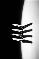 fork in  macro shot creating an abstract composition. Image is suitable as a background.