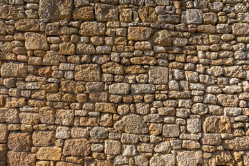 Medieval stone wall in Domme, Dordogne, France