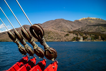 The reels on the ship with background of the lake.