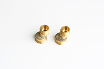 Metal brass water pipe fittings. Materials for plumbing works.