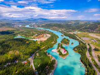 Fototapeta na wymiar Blue Katun river lake Aya Altai mountains republic Russia, aerial top view