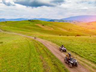 ATV rider rides through forest off-road in summer © Parilov